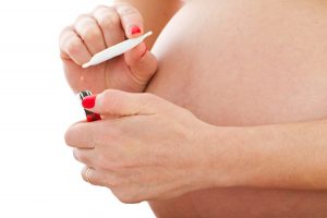 Pregnant Woman Smoking Marijuana